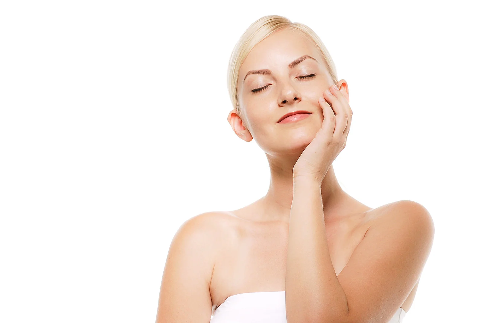 顔に手を当てた女性 